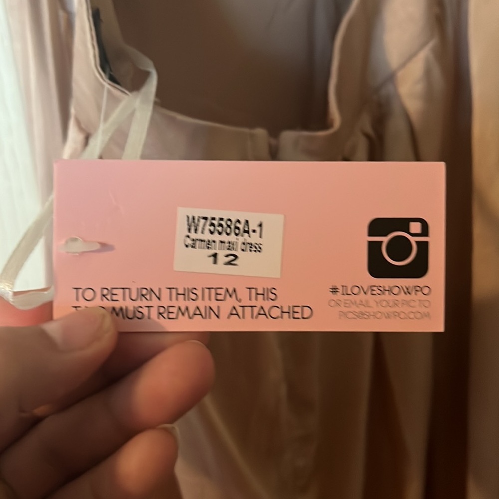 Long maxi dress size 12 in color rose gold.